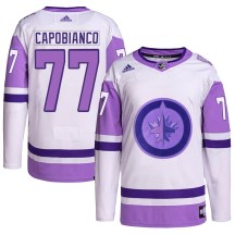 Winnipeg Jets Men's Kyle Capobianco Adidas Authentic White/Purple Hockey Fights Cancer Primegreen Jersey